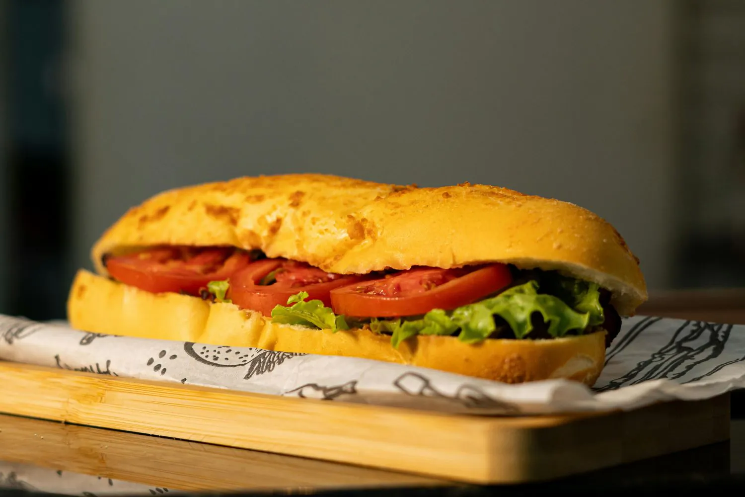 Sub sandwich with fresh lettuce and tomato at J Burger n Wings, a Fast - Food Restaurant in Muskegon